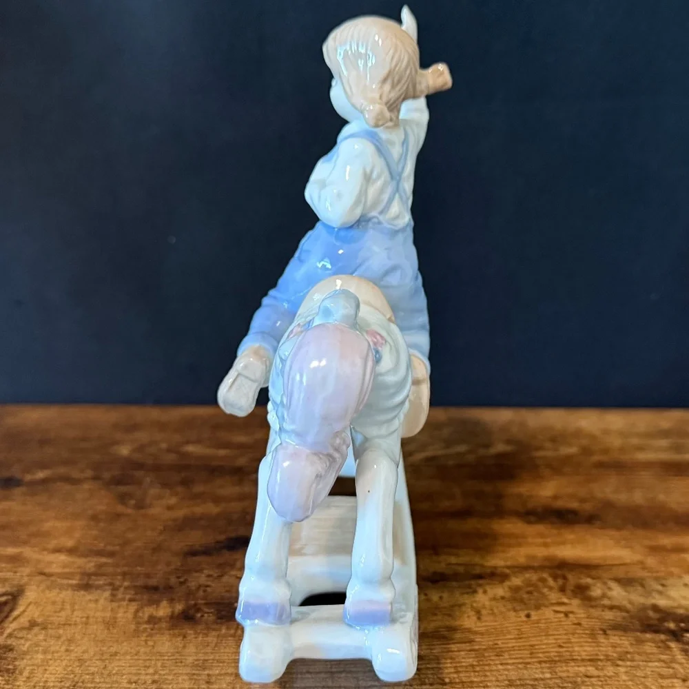 1991 MEICO PAUL SEBASTIAN Girl Riding Rocking Horse Figurine